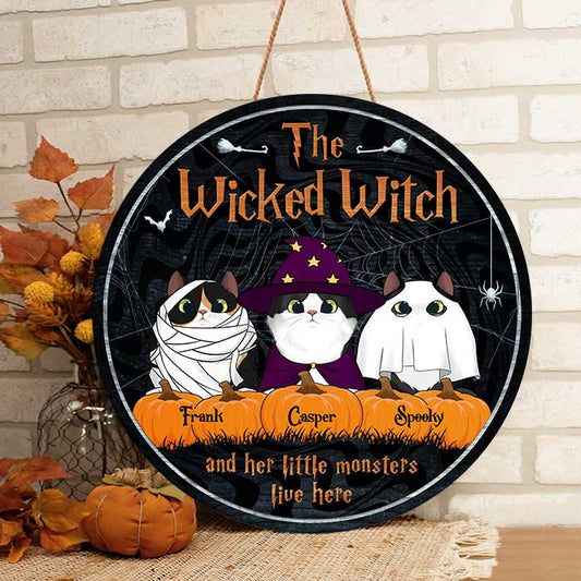 The Wicked Witch And Her Little Monsters Live Here Peeking Cats - Funny Personalized Cat Door Sign