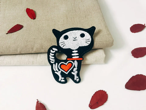 Skeleton cat patch with red heart